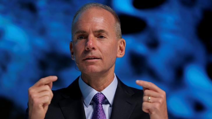 President, Chairman and CEO of The Boeing Company Dennis Muilenburg speaking at a conference