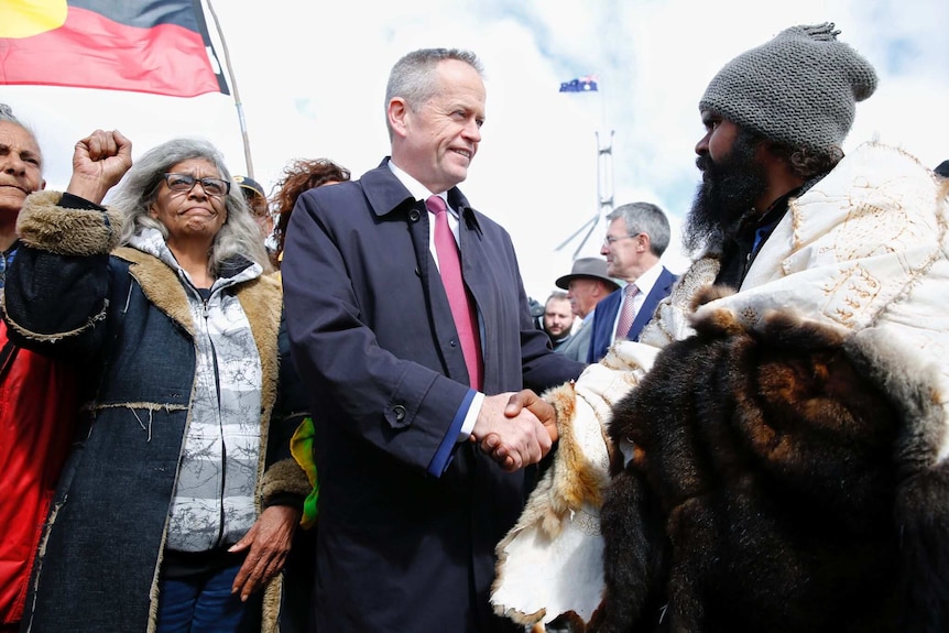 Clinton Pryor speaks with Bill Shorten and shakes his hand.