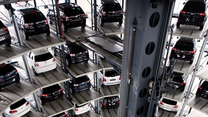 Rows of cars stacked and stored at Volkswagen factory