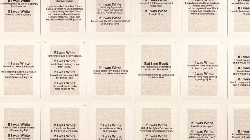 Artwork by the artist Vernon Ah Kee featuring a series of A4 pages of text starting with "if i was white"