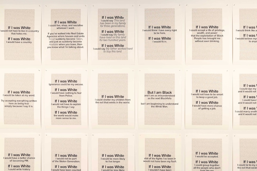 Artwork by the artist Vernon Ah Kee featuring a series of A4 pages of text starting with "if i was white"