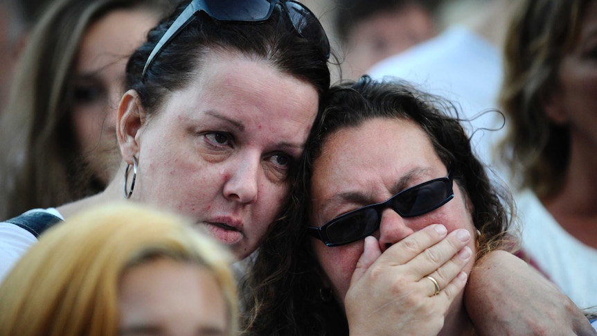 Mourners gather to remember victims of flight MH17 in Amsterdam