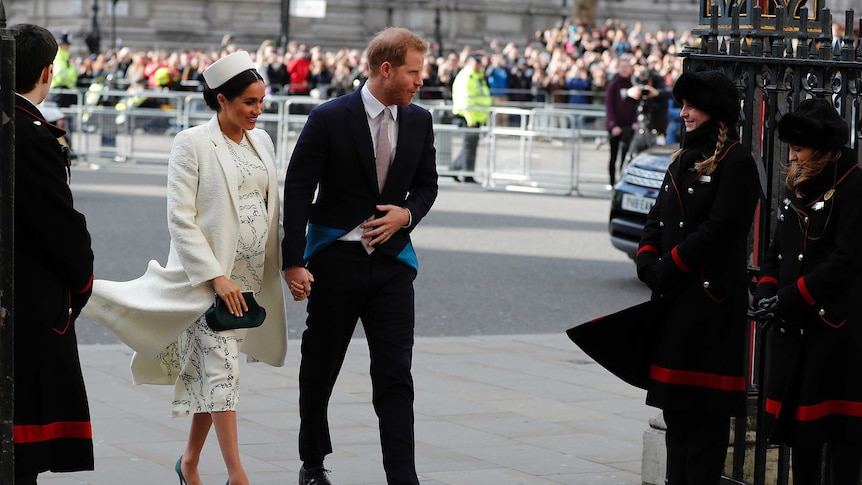 Harry and Meghan arriving at a public event.