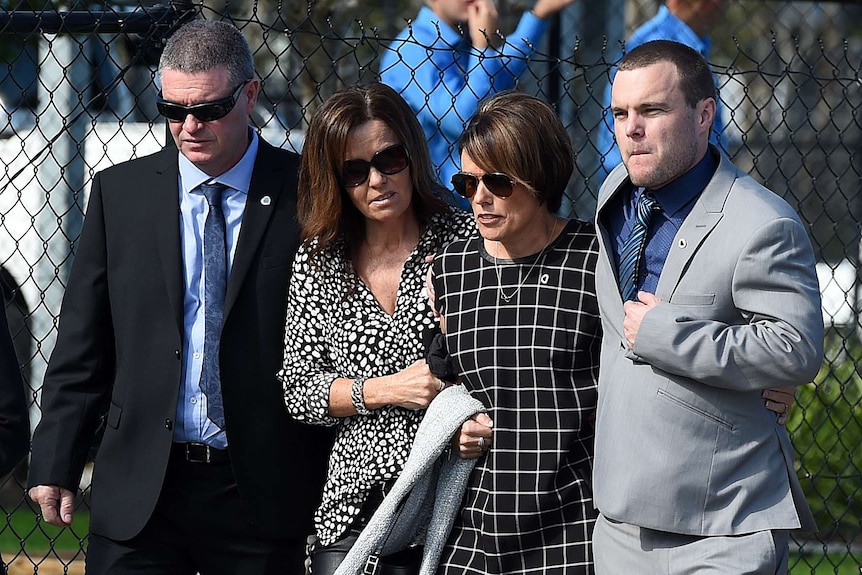 Family arrives for funeral