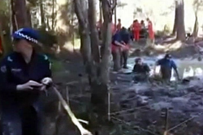 Police search swampy area for missing teenager Daniel Morcombe
