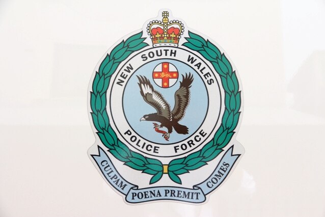 NSW Police logo generic; side of a police van in Newcastle