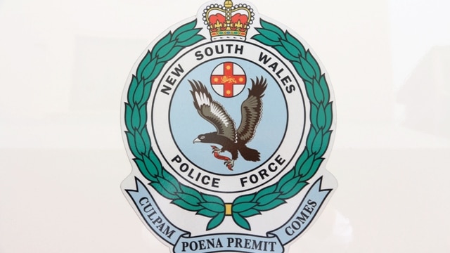 NSW Police logo generic; side of a police van in Newcastle