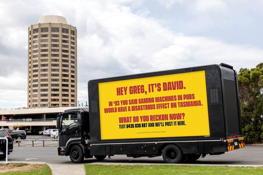 A mobile billboard with David Walsh's message to Greg Farrell, Wrest Point, February 2018.