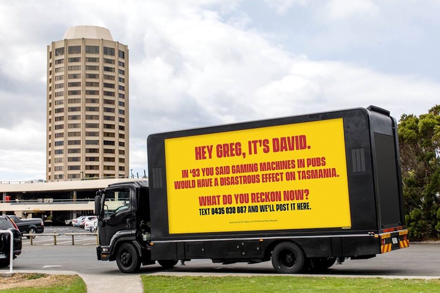 A mobile billboard with David Walsh's message to Greg Farrell, Wrest Point, February 2018.