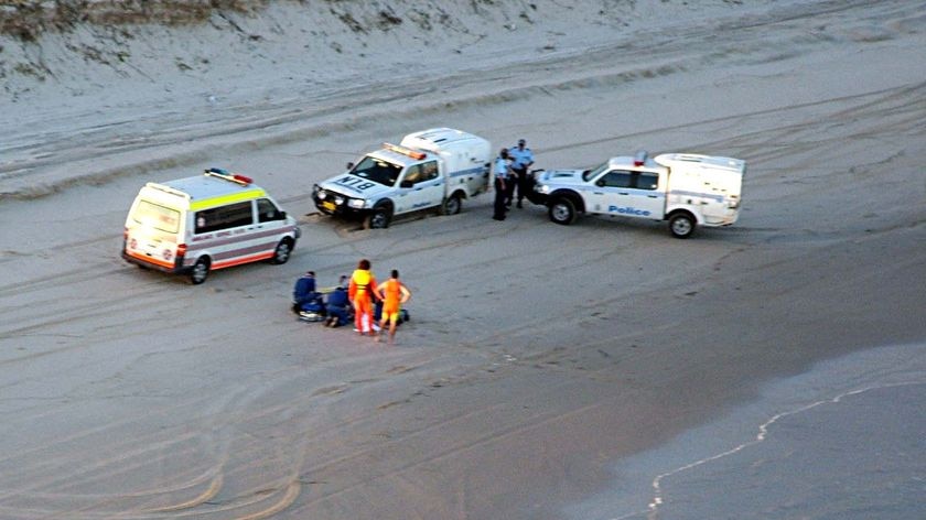 Emergency services personnel gather at South Ballina beach in northern NSW