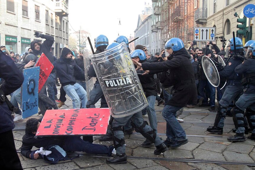 Police and protesters clash in Italy.