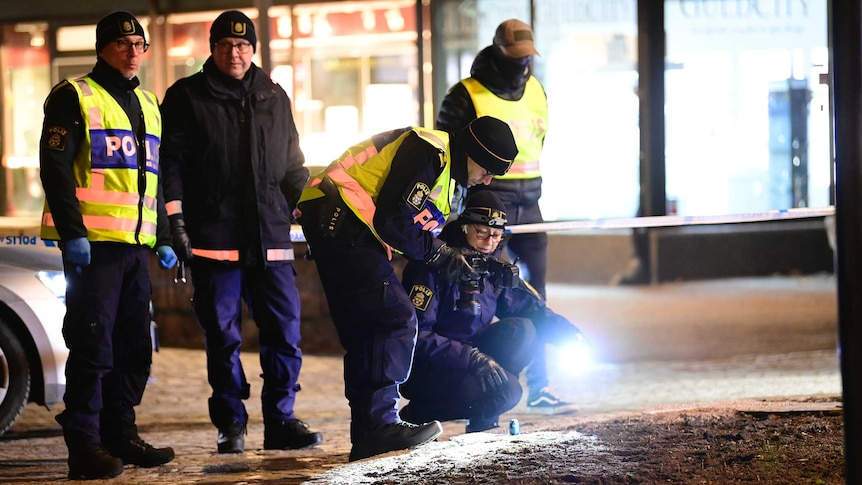 Police are seen in the area after several people were attacked