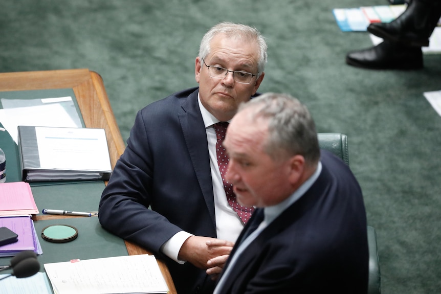 Scott Morrison watches on as Barnaby Joyce speaks in Question Time