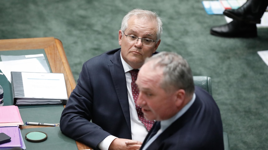 Scott Morrison watches on as Barnaby Joyce speaks in Question Time