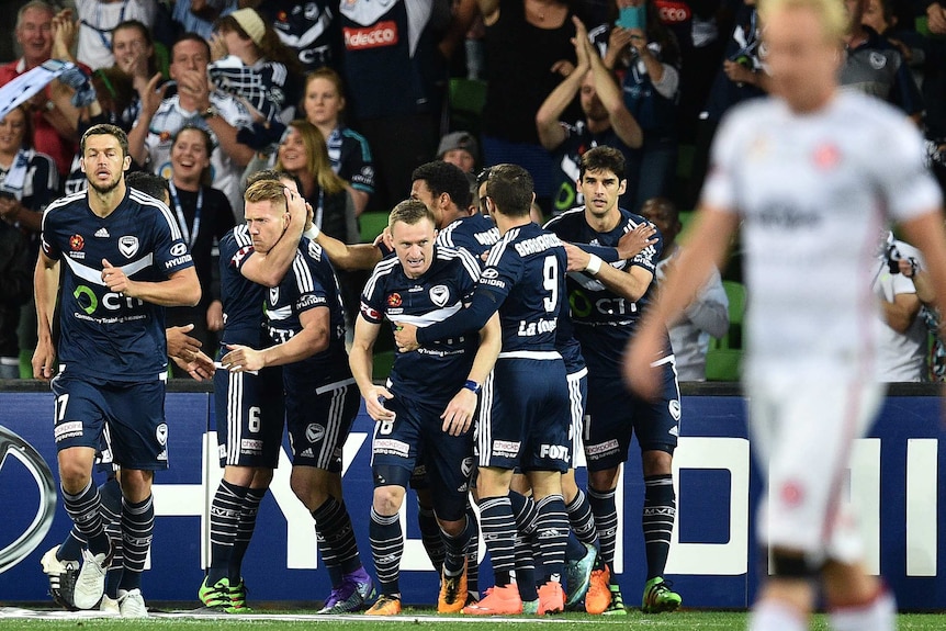 Melbourne Victory players celebrate Oliver Bozanic's goal