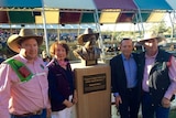 Graeme's son Tom Acton, wife Jenny Acton, Prime Minster Tony Abbott and brother Evan Acton unveil a statue of the cattleman.