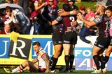 Another one on the board ... Jamie Lyon and Will Hopoate celebrate one of Manly's eight tries.