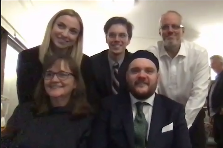 A screenshot of Max and his family on his wedding day.