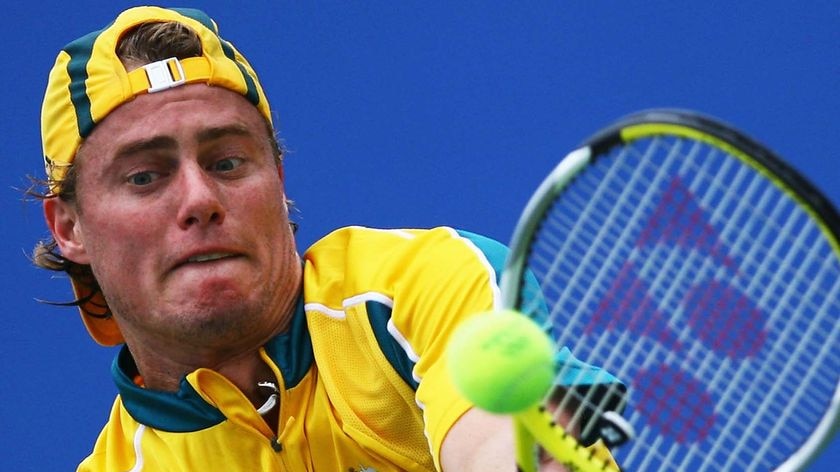 Lleyton Hewitt plays a backhand