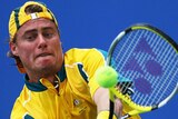 Lleyton Hewitt plays a backhand