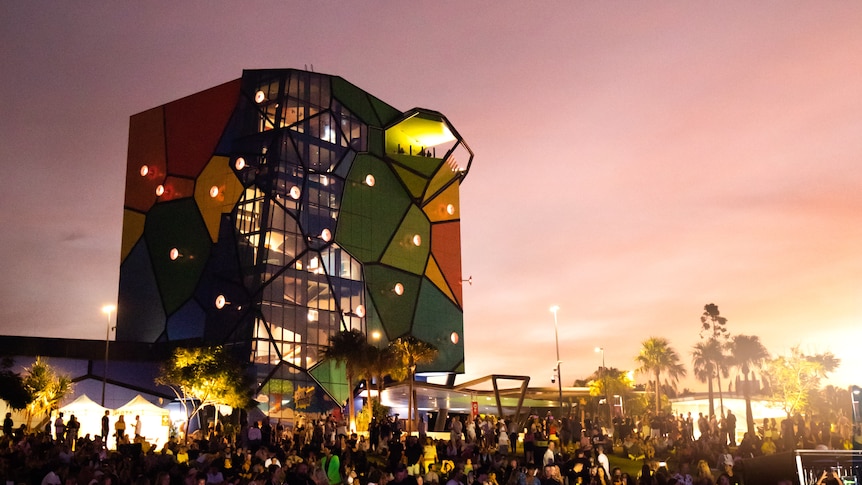 large colourful building at sunset