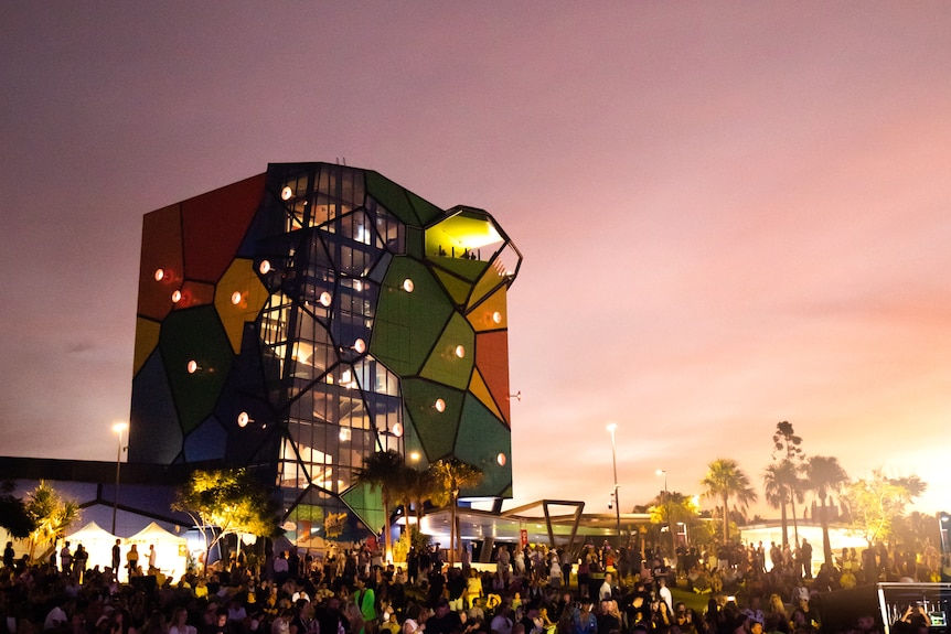 large colourful building at sunset