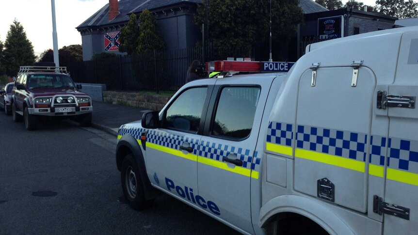 Police outside the Rebel Motorcycle Club's North Hobart clubrooms