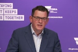 Daniel Andrews giving a press conference.