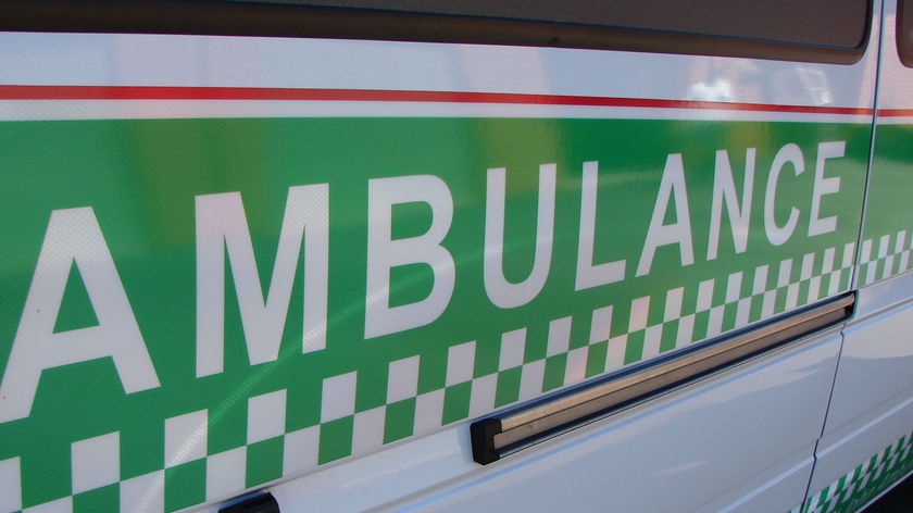 The side panel of a St John Ambulance vehicle close-up.