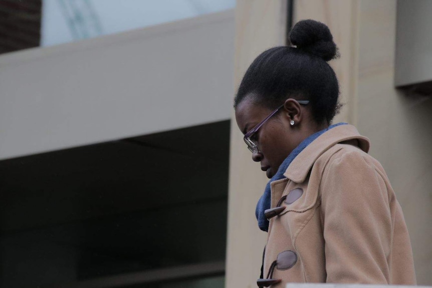 Maurine Riziki outside the Magistrates Court in Hobart