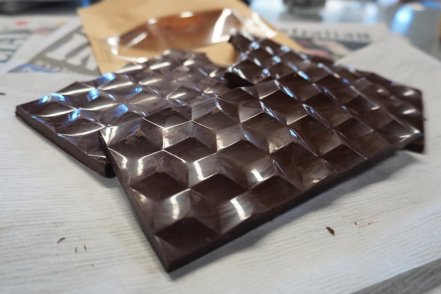 A block of chocolate with an interesting design pattern. 