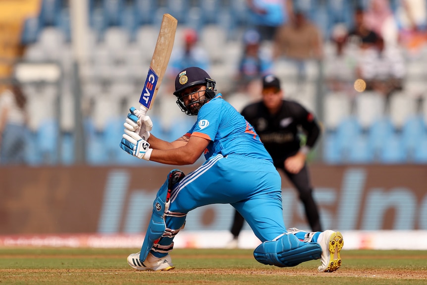 Rohit Sharma bats and looks back over his shoulder