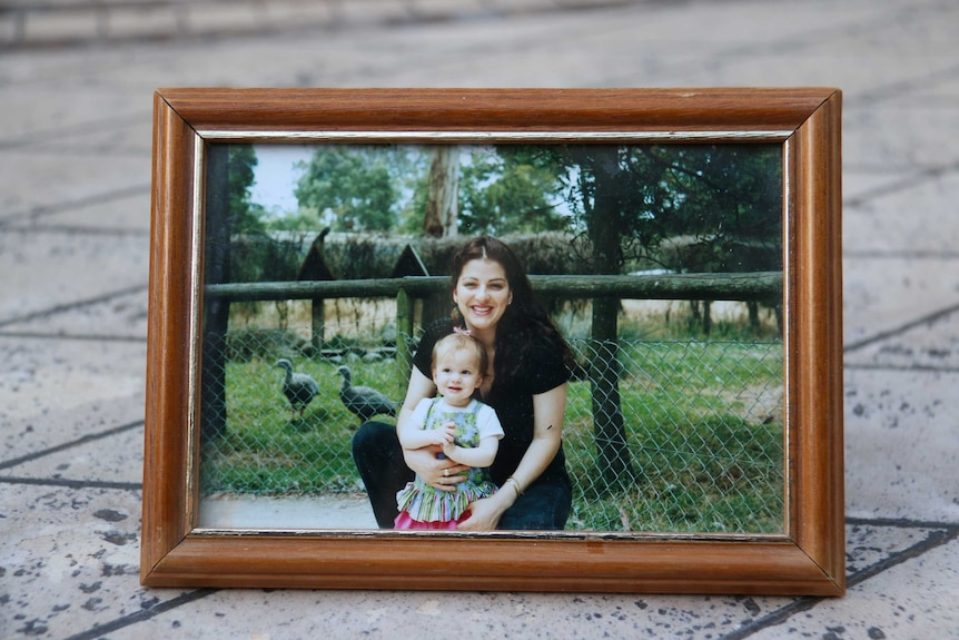 A photo of Josie with her daughter as a toddler at the zoo.