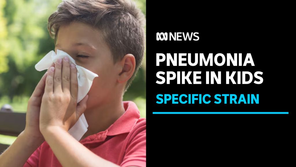 Pneumonia Spike in Kids, Specific Strain: A boy blows his nose into tissues.