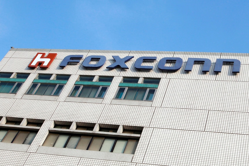 The Foxconn logo is seen on the headquarters building
