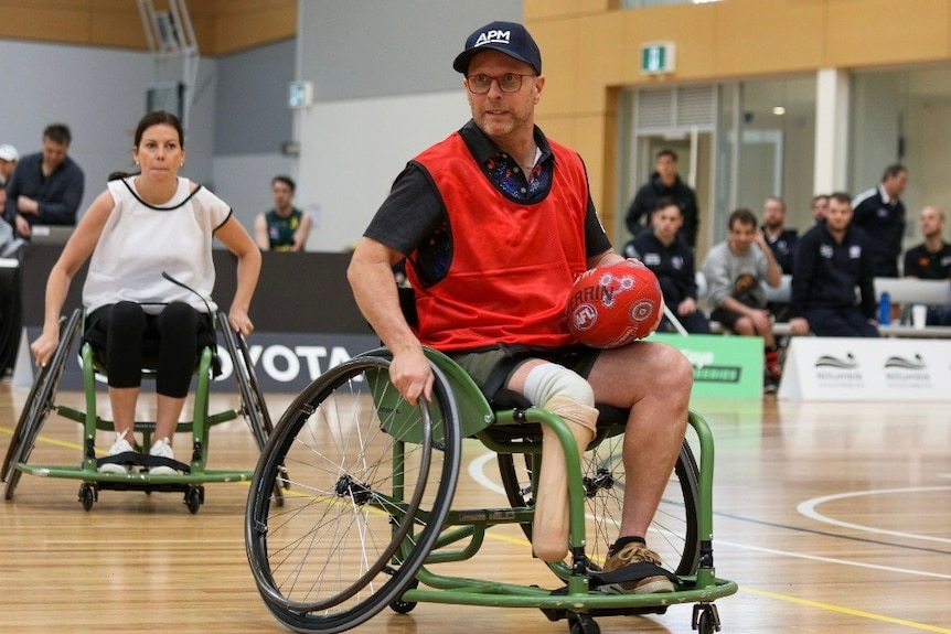 Jason playing wheelchair AFL