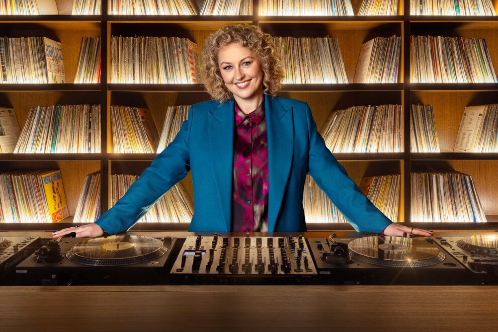 ABC Prester Zan Rose in front on a music desk