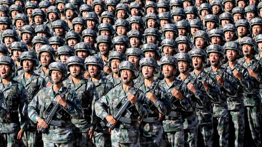 Soldiers of China's People's Liberation Army get ready for the military parade.