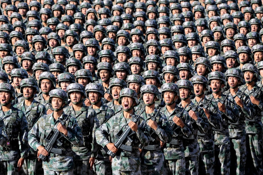 Soldiers of China's People's Liberation Army get ready for the military parade.