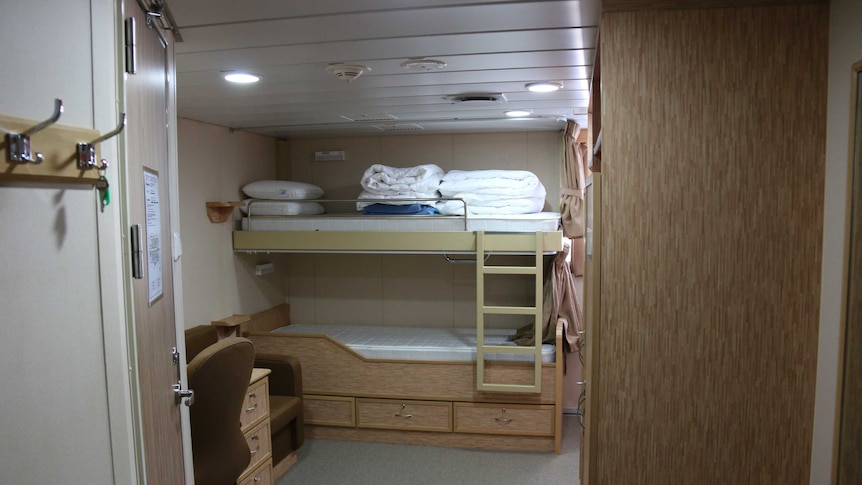 A bedroom cabin onboard The Investigator