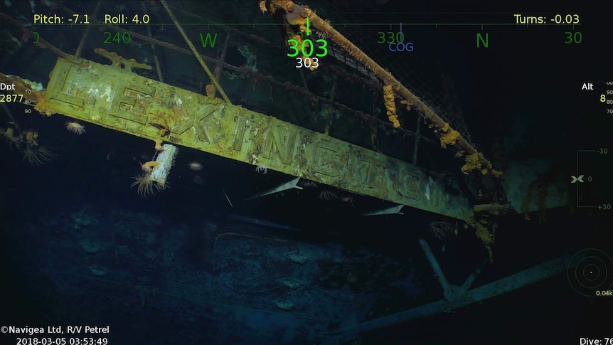 Wreckage of the USS Lexington shows a decaying plate that reads "LEXINGTON".