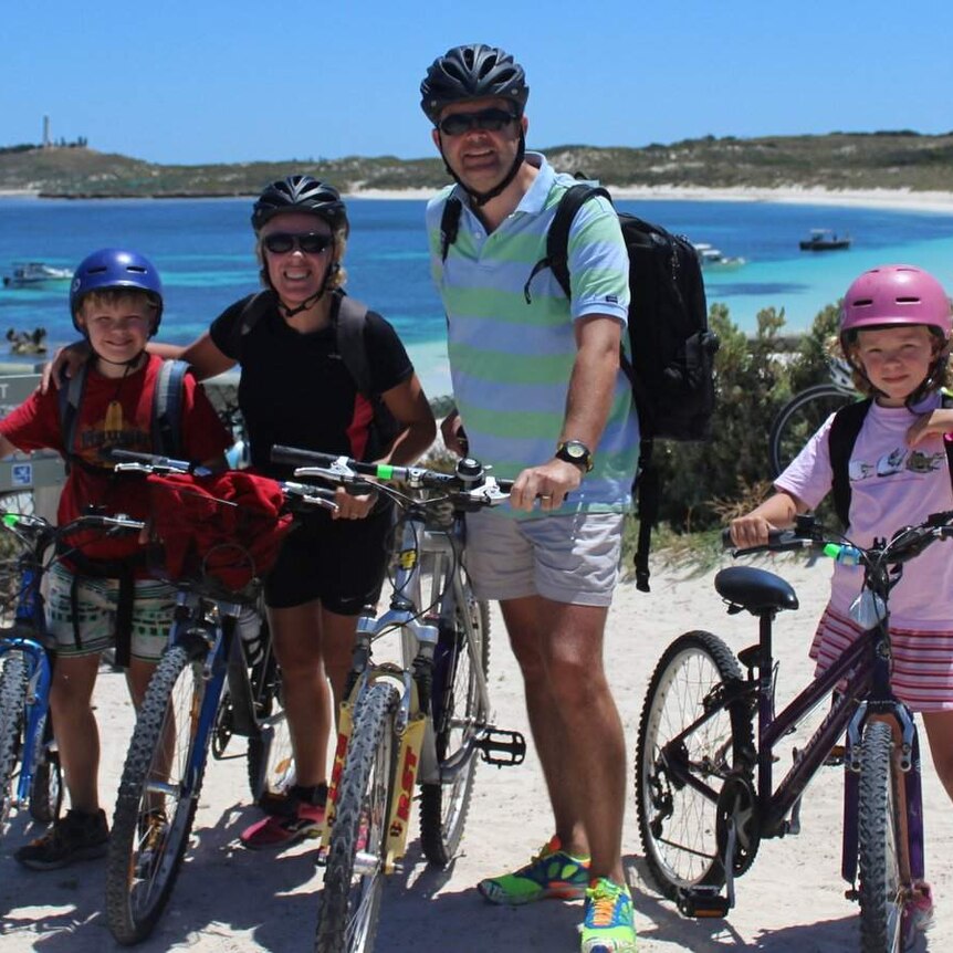 Gill Kenny with her husband and two children on bikes on Rottnest Island