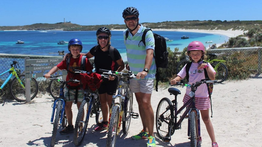 Gill Kenny with her husband and two children on bikes on Rottnest Island