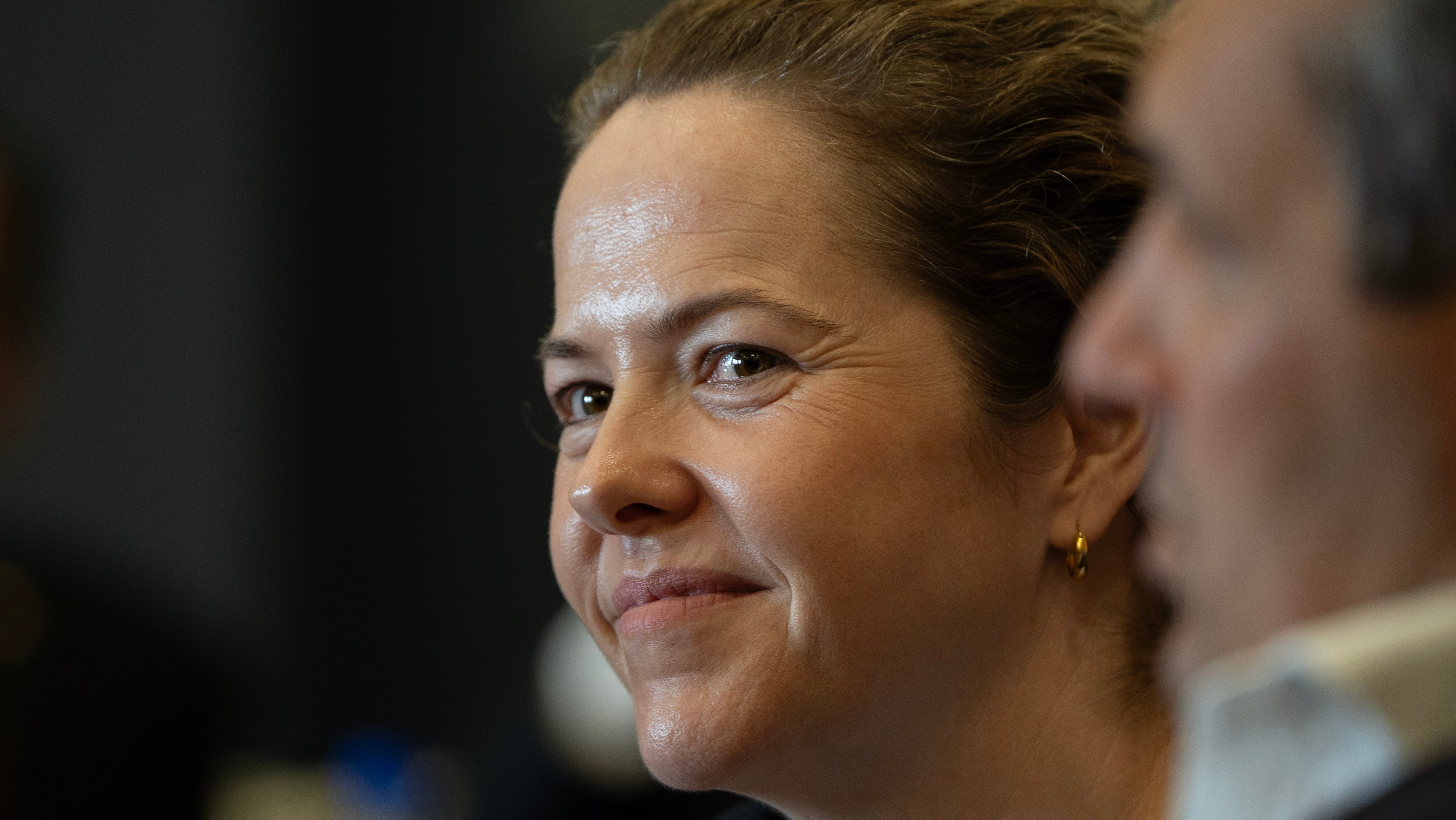 A woman smiling 
