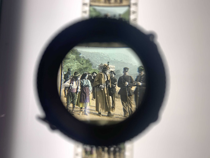 A 1900s photo seen through a magnifying glass.