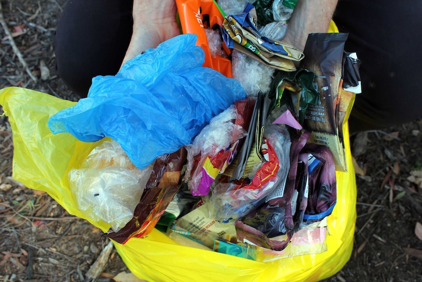 Plastic wrappers in a plastic bag.