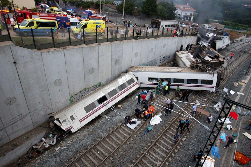 Rescuers work at the scene of a train crash near Santiago de Compostela.