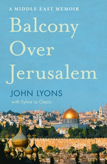 A book showing the Jerusalem cityscape under a bright blue sky