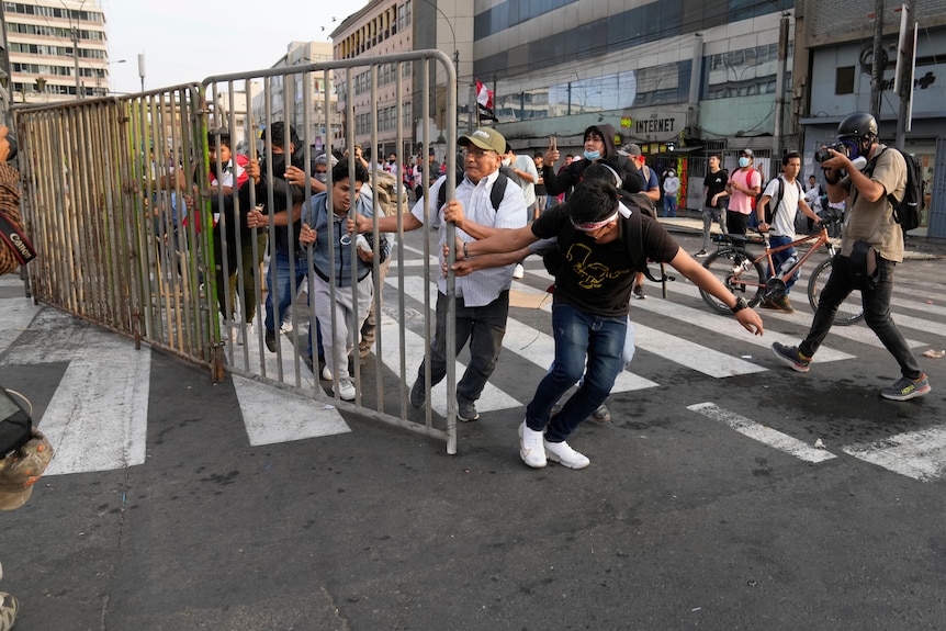 Picture of a group of men protesting on a street