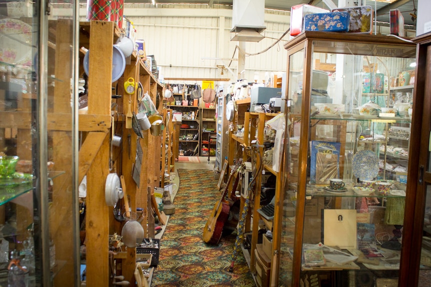 The shelves of an antiques store at Paringa crammed with collectables.